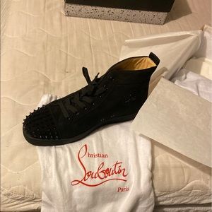Christian Louboutin  Red bottoms